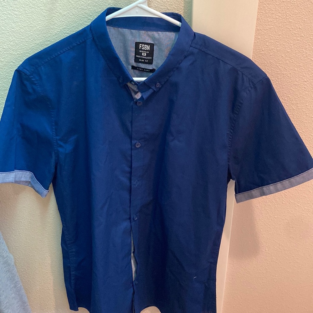 Blue button up collared shirt